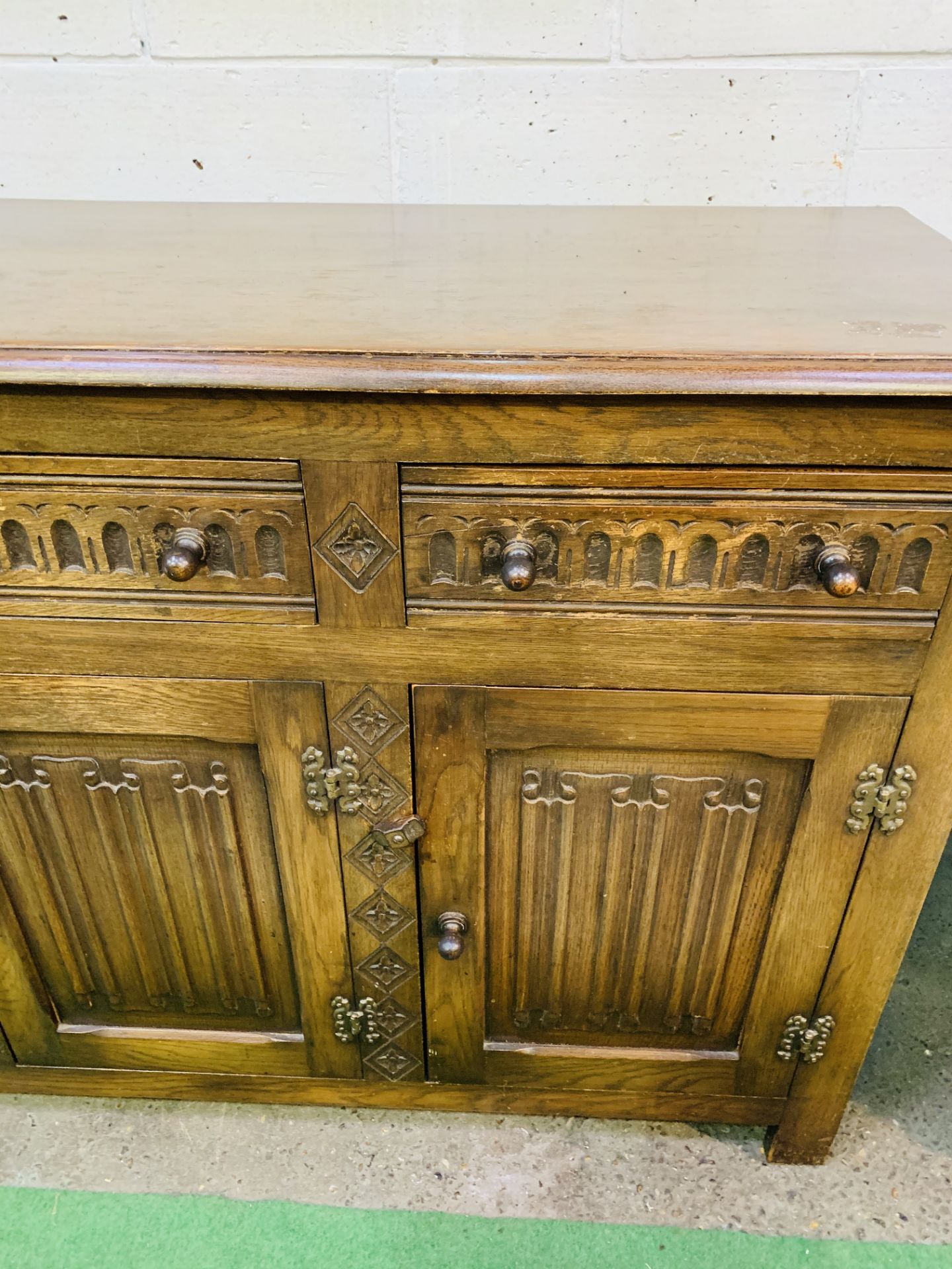 1930's oak sideboard with three frieze drawers over three cupboards. - Image 2 of 6