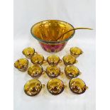 Iridescent glass punch bowl with 12 cups.