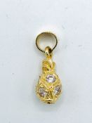 18ct gold pineapple charm pendant set with CZs