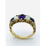 9ct gold opal and amethyst ring, size M, weight 4.1gms.