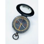 Travel compass in white metal case, and an Orvis pocket watch