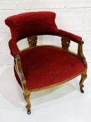 Early 20th Century red velvet library chair.