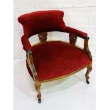 Early 20th Century red velvet library chair.