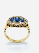 15ct gold, diamond and sapphire ring.