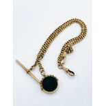 9ct gold pocket watch fob with plain bezelled red and green seal, length of fob 40cms, weight 42gms.