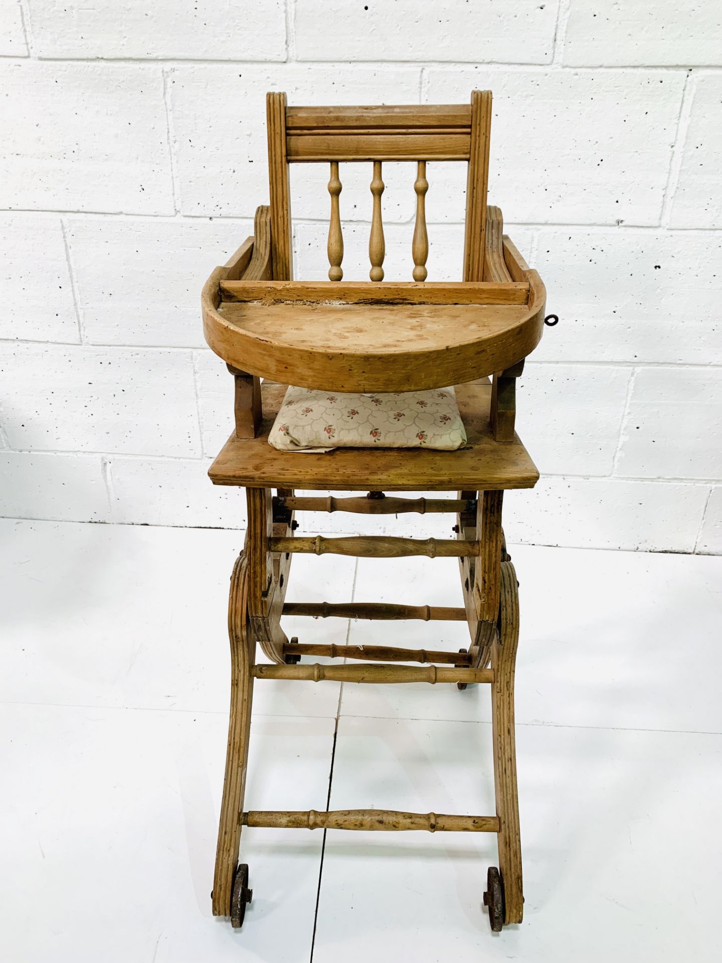 Metamorphic wooden high chair by S. Ockenden and Son.