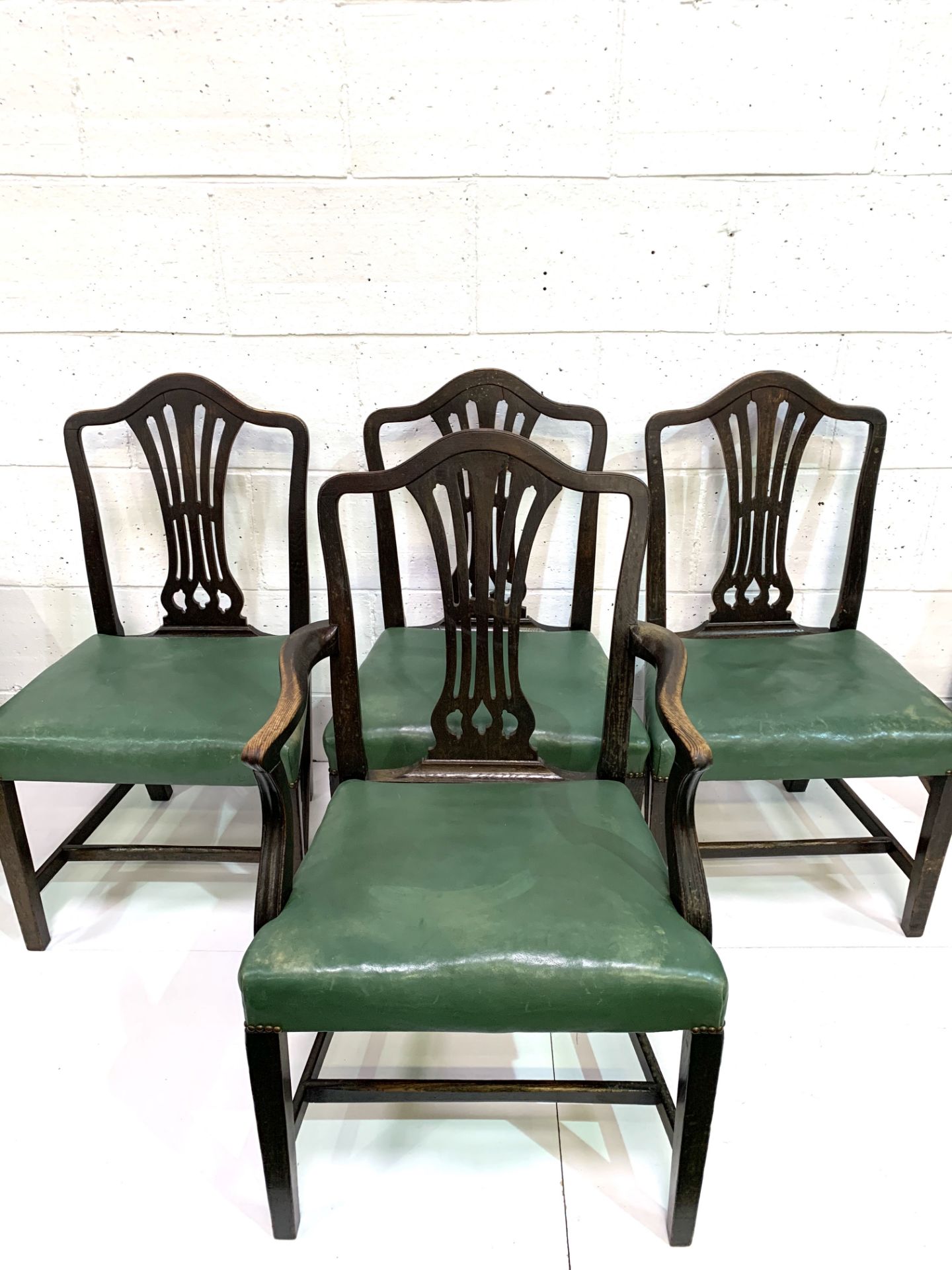 Set of four Victorian dining chairs, three plus one, upholstered in green leather. - Image 4 of 5