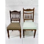 Two mahogany framed Edwardian rail back chairs with upholstered seats.