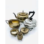 Silver teapot, sugar bowl, tea caddy, salt, mustard, and pepper pot. Gross total weight 32.87 ozt