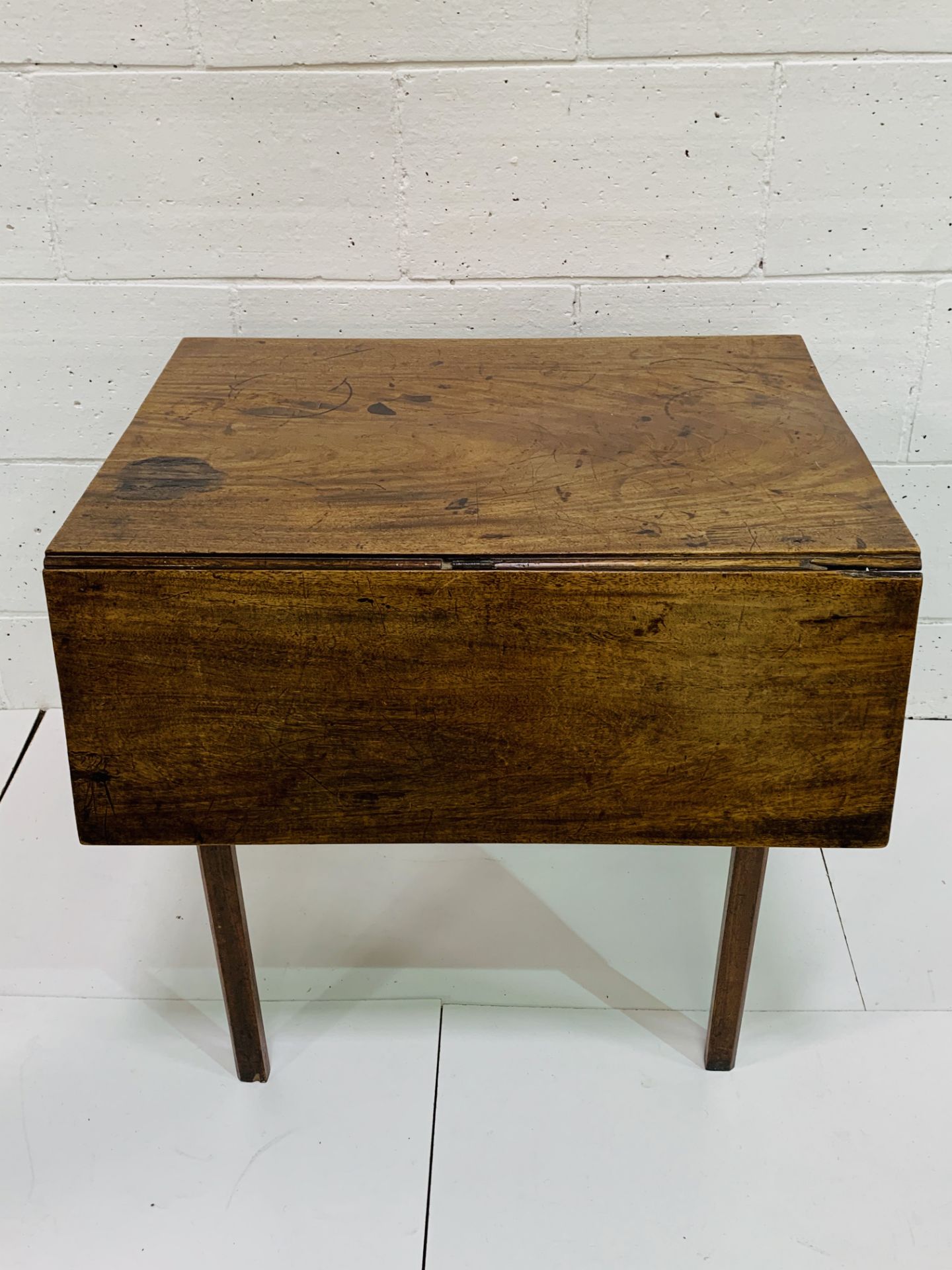 Late 18th Century mahogany drop leaf table, with end drawer.