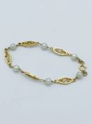 14kt gold and pearl bracelet.