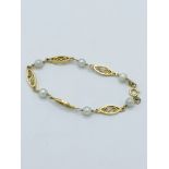 14kt gold and pearl bracelet.