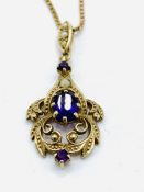 9ct gold chain with 9ct gold pendant set with amethysts and seed pearls, 7.7gms