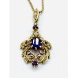 9ct gold chain with 9ct gold pendant set with amethysts and seed pearls, 7.7gms