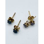 Four pairs of 9ct gold earrings.