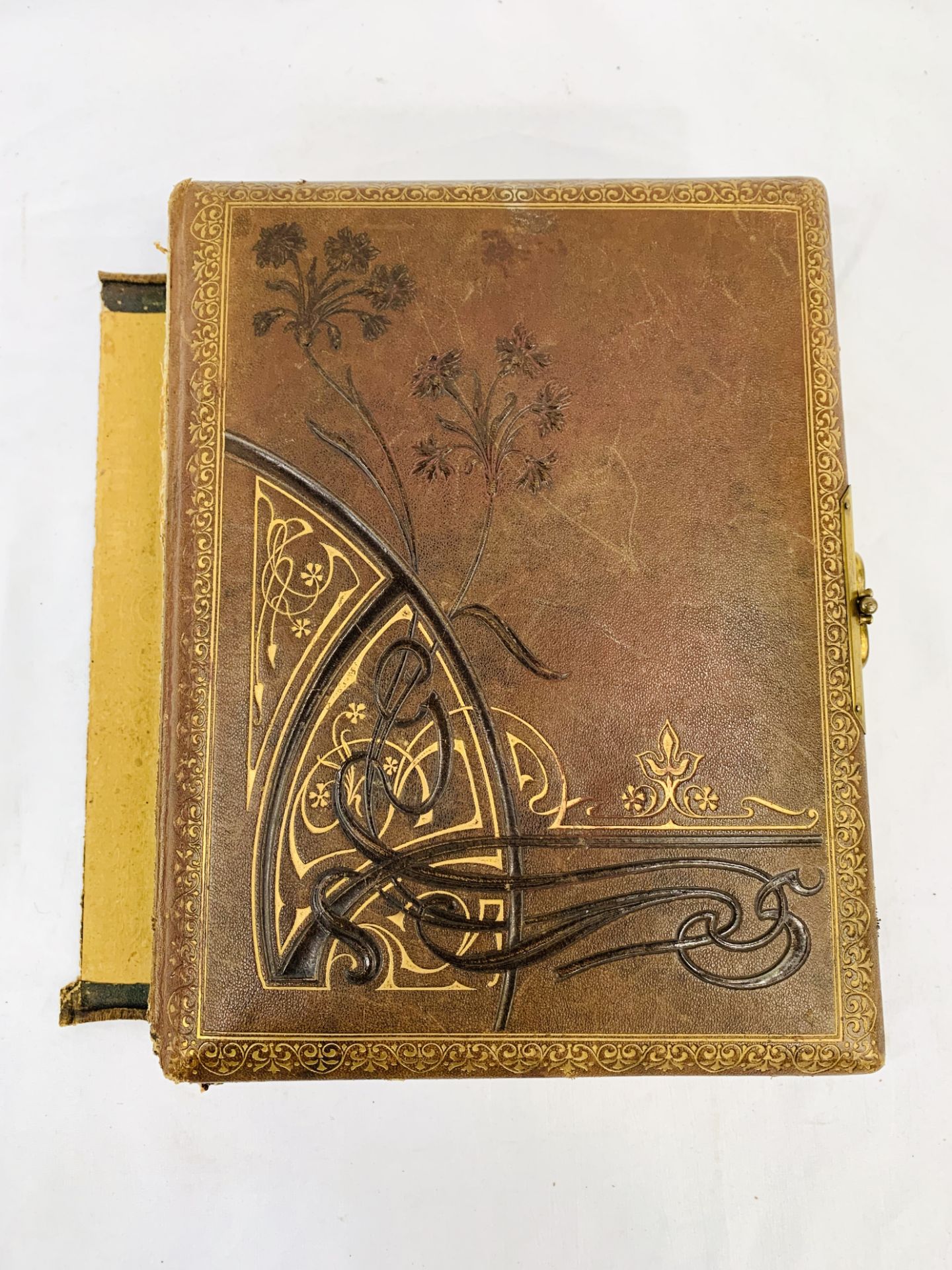 Tooled leather bound Edwardian photograph album.