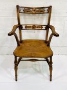 Arts and Crafts style oak and elm open arm chair.