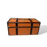 Louis Vuitton Malle trunk in orange canvas