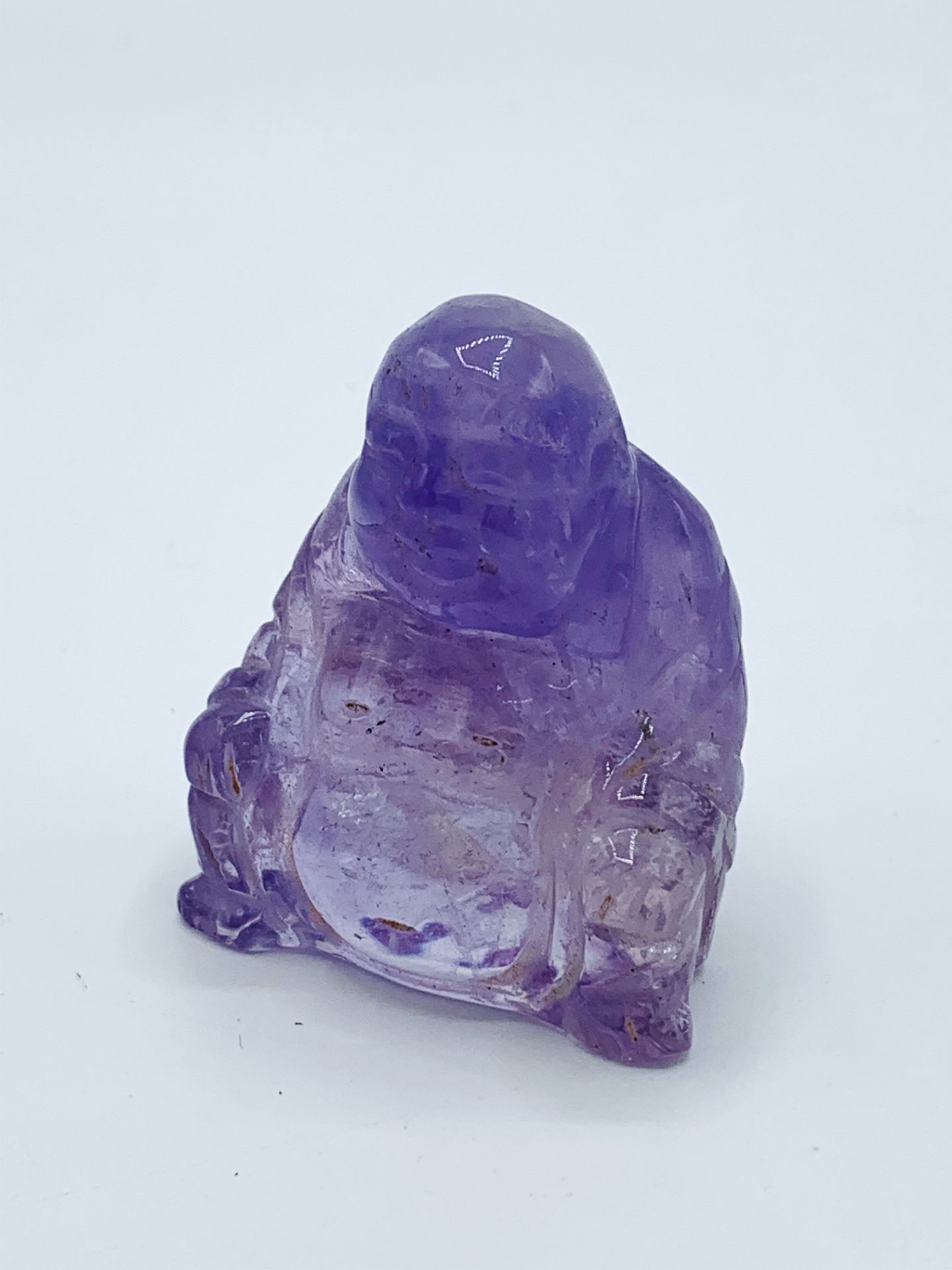 Hand carved Amethyst figure of the laughing Buddha