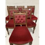 Set of six Victorian red upholstered dining chairs.