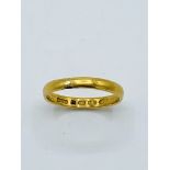 22ct gold band, size S 1/2, weight 3.7gms.