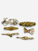 4 no. 9 ct gold brooches, total weight 7.1 gms; together with 2 yellow metal brooches.