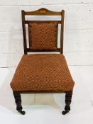 Mahogany Edwardian nursing chair with fan inlay and stringing.