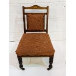 Mahogany Edwardian nursing chair with fan inlay and stringing.