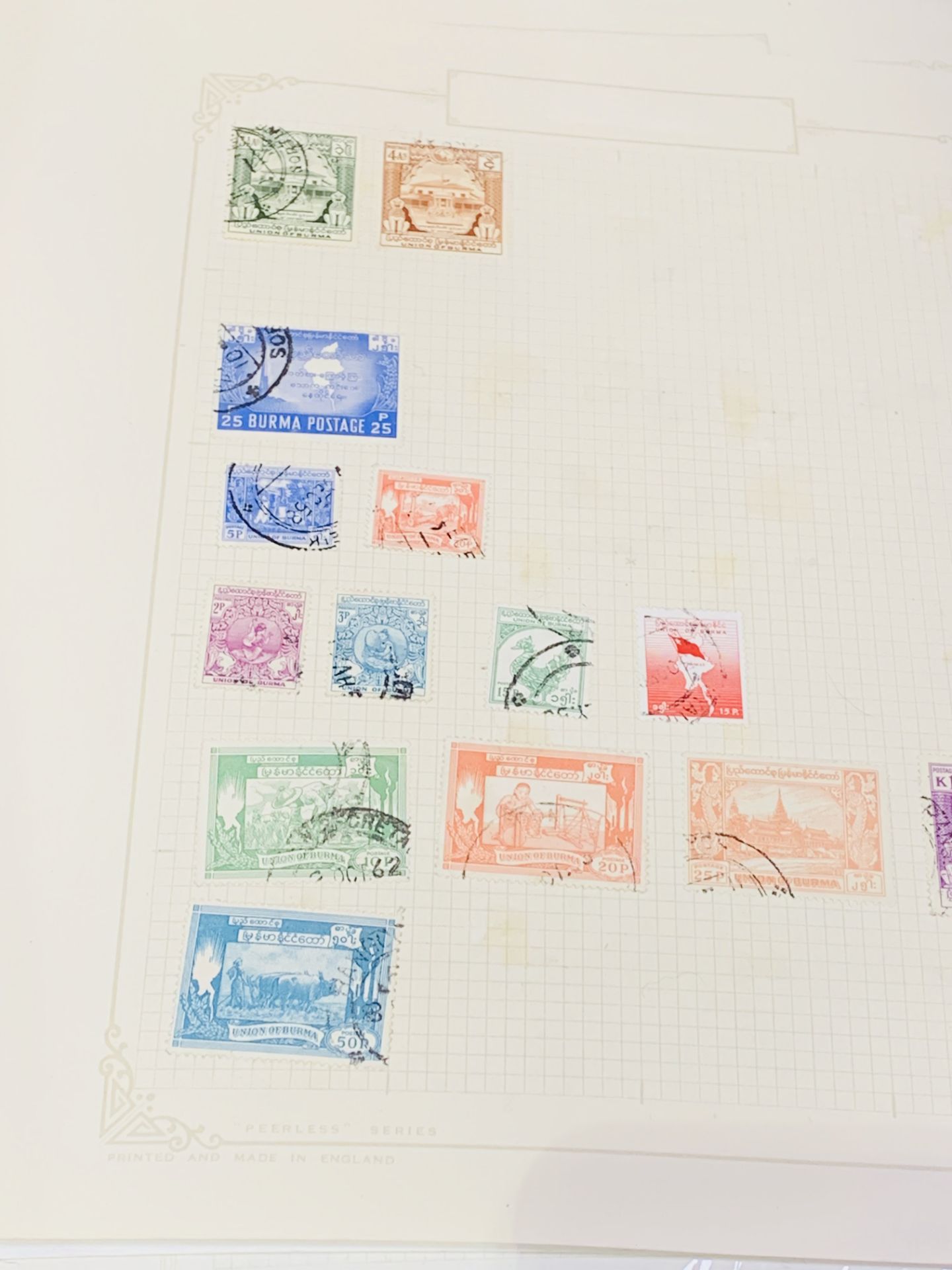 A large quantity in a black tray of world stamps on pages. - Image 4 of 4