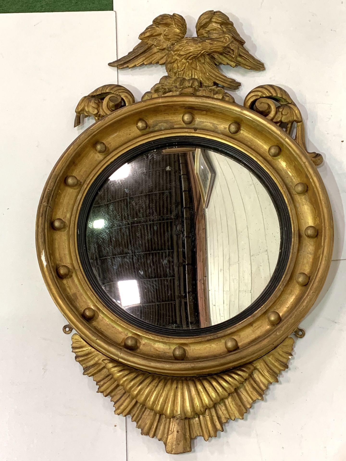 Regency circular convex glass wall mirror in a gilt frame, with eagle surmount. - Image 2 of 2