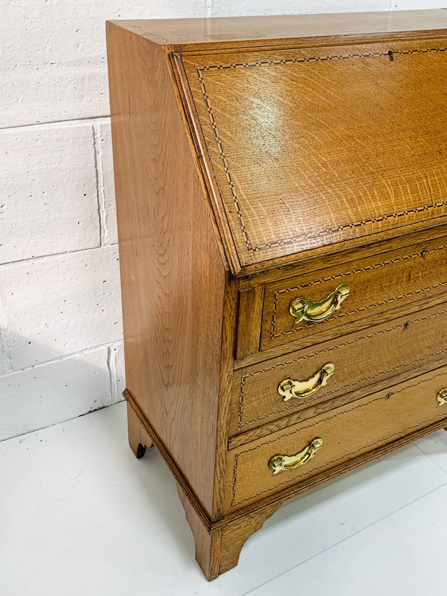 Small oak bureau with fitted interior, string inlay and brass handles, complete with key. - Image 4 of 4