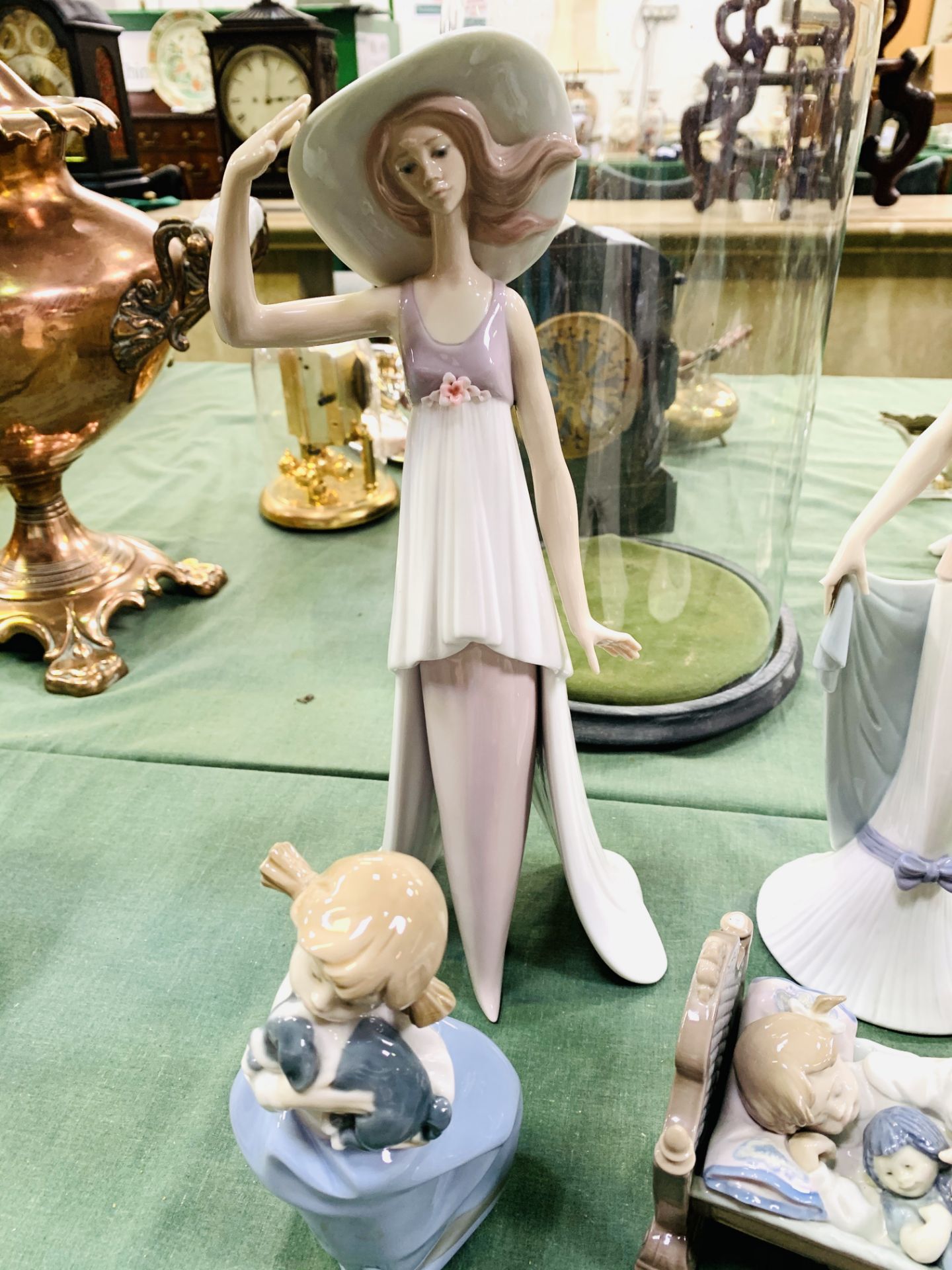 Four Lladro figurines and two Nao figurines. - Image 3 of 4