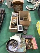 A collection of watch and clock parts for spares and repairs, together with a clock.