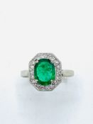 Diamond and emerald ring.