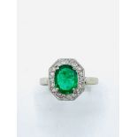 Diamond and emerald ring.