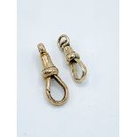 A pair of 9ct gold clip hooks for watch fobs.