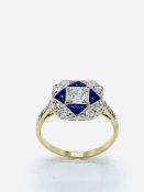 Diamond and blue enamel ring.