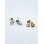 Pair of peridot earrings and 9ct white stone set earrings 1.1gms.