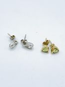 Pair of peridot earrings and 9ct white stone set earrings 1.1gms.