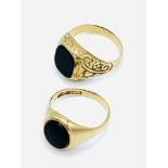 2 x 9ct gold signet rings with black stones, 8.5gms