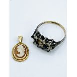 9ct gold and silver blue and white stone ring and 9ct gold cameo pendant.