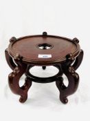 Chinese Ebonised serpentine legged jardiniere stand, height 40cms.