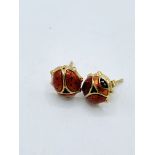 9ct ladybird earrings 1.5gms.