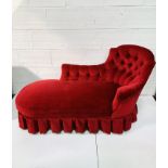 Red velour upholstered buttoned back chaise longue.