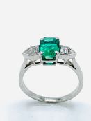 White gold, emerald and diamond ring.