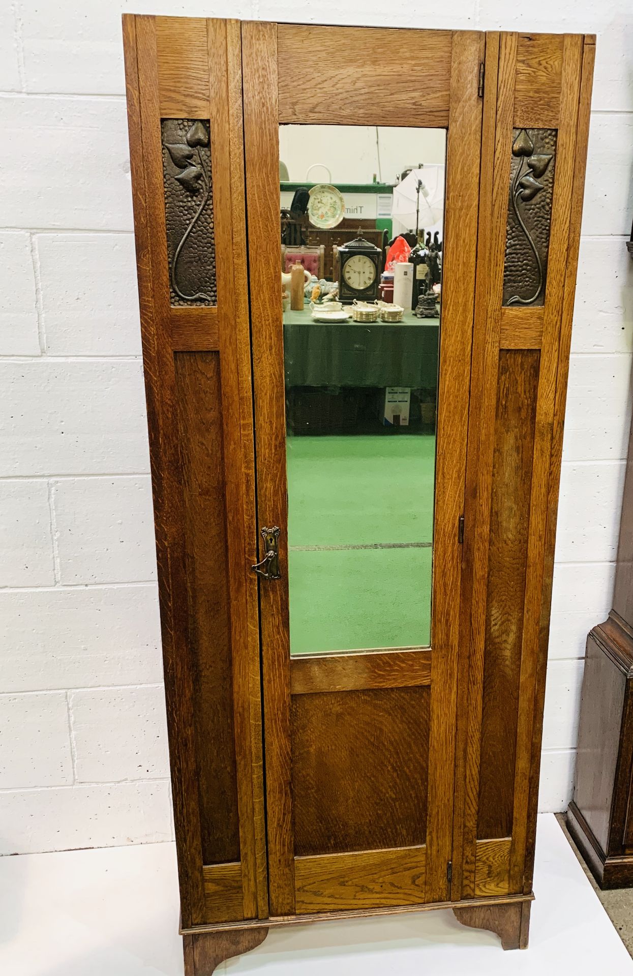 1930's oak wardrobe with mirror door and copper decorative panels