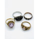 9ct gold and pale pink stone ring; white metal and red stone ring; and 2 yellow metal rings