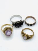 9ct gold and pale pink stone ring; white metal and red stone ring; and 2 yellow metal rings