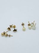 Four pairs of 9ct gold earrings.