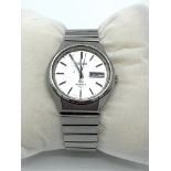 Seiko 4004 quartz, date and time wrist watch, in box. Estimate £20-30.